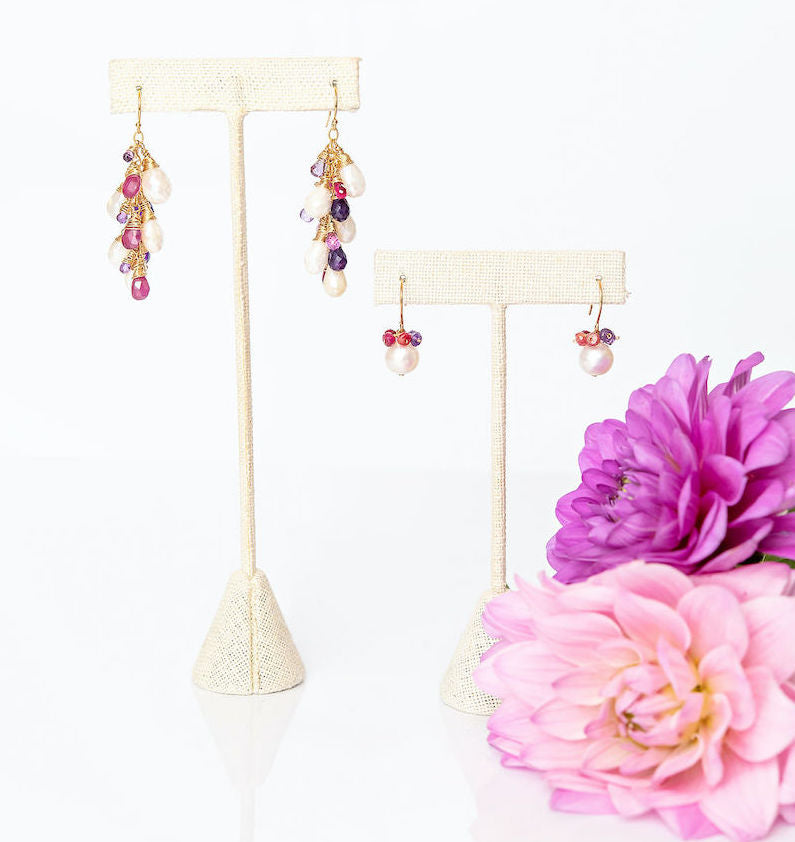These earrings are the perfect Spring and Summer statement piece. The white moonstone, pink sapphires and purple amethyst sparkle beautifully as they cascade in a waterfall from gold-filled ear wires. These are sure to turn some heads!
