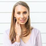 Gorgeous faceted lavender quartz teardrops are accented by pops of pink, purple and pale blue to create a delicious ensemble of bright, candy-like colors. These beauties are new favorites!