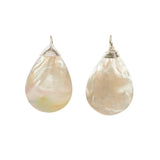 Simple. Chic. Beautiful. These mother of pearl earrings are a classic design - perfect to throw on with your favorite Summer dress or shorts and a fun top. Getting married soon? These also look lovely as bridesmaid gifts - they will look great in photos and they're a gift that your girls are sure to wear for years to come!