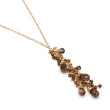 Simple, yet chic, this necklace is a go-to piece, for sure! Sapphires and zircon sparkle beautifully in champagne, green and brown as they cascade down the 2" drop of this y-shaped waterfall necklace.