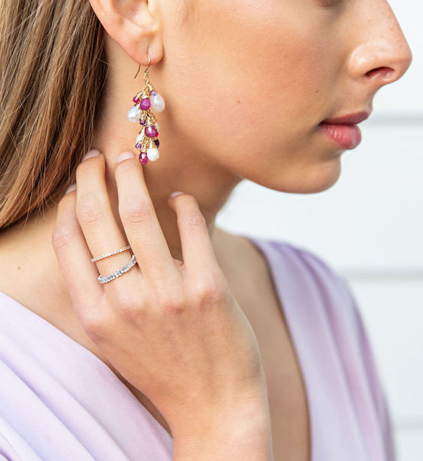 These earrings are the perfect Spring and Summer statement piece. The white moonstone, pink sapphires and purple amethyst sparkle beautifully as they cascade in a waterfall from gold-filled ear wires. These are sure to turn some heads!