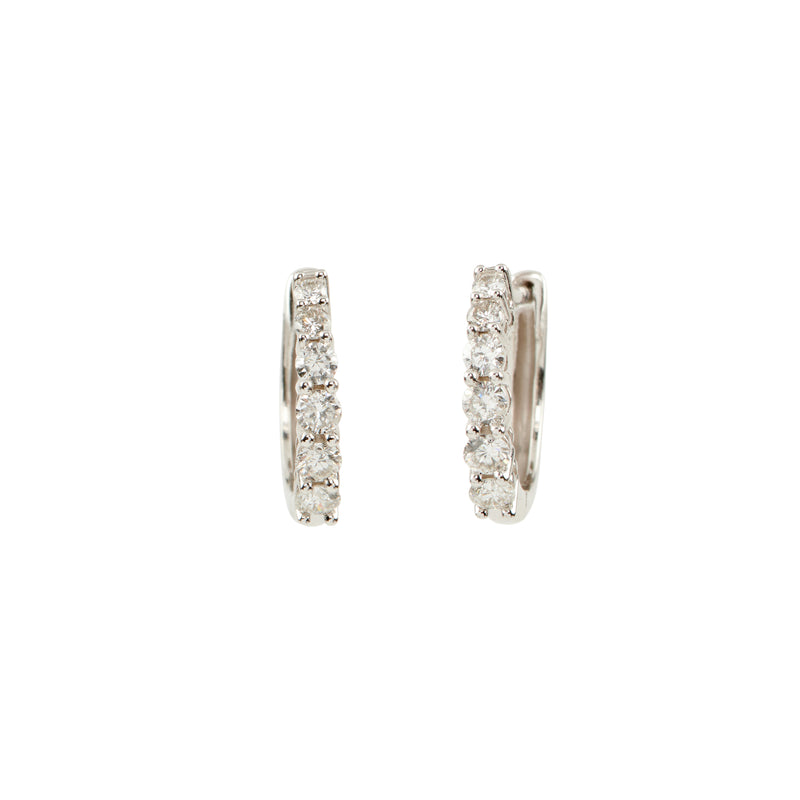 Classic. Simple. Gorgeous. These dainty diamond hoop earrings look gorgeous alone or with one of our gem drops swinging from them for the ultimate in versatility!