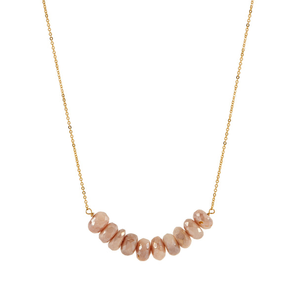 This pale peach beauty is the perfect addition to your Summer wardrobe! It looks great worn alone or as the shortest piece in a layered look. 